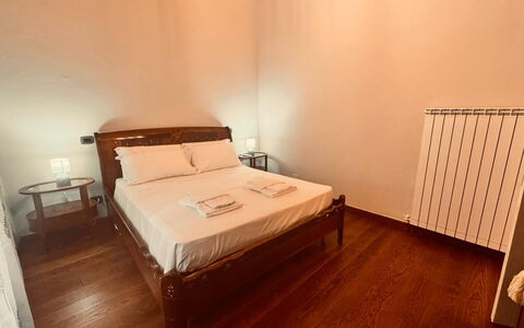 Casa Castelli: Bed, Bedroom, Floor, Wood, Bed Sheet, Flooring, Bedding, Interior Design, Furniture, Bed Frame