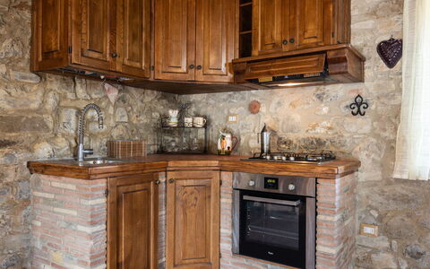 La Casina Honeymoon Cottage, Badia Agnano: Wood, Cabinetry, Kitchen, Countertop, Interior Design, Flooring, Cupboard, Furniture, Home, Drawer