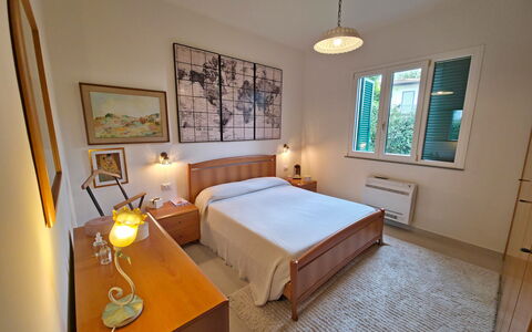 Villetta Tonfano: Bed, Bedroom, Wall, Interior Design, Flooring, Furniture, Wood, Floor, Bed Sheet, Ceiling