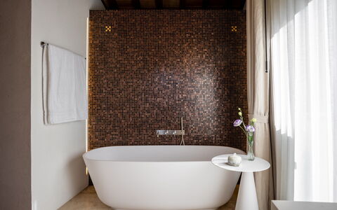 Il Gabbro, Luxury Experience: Wall, Plumbing Fixture, Interior Design, Flooring, Bathroom, Bathtub, Brown, Floor, Lighting, Plumbing