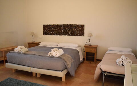 Appartamento la Fontana, Assisi: Furniture, Bed, Bedroom, Bed Sheet, Interior Design, Bedding, Wood, Textile, Floor, Room