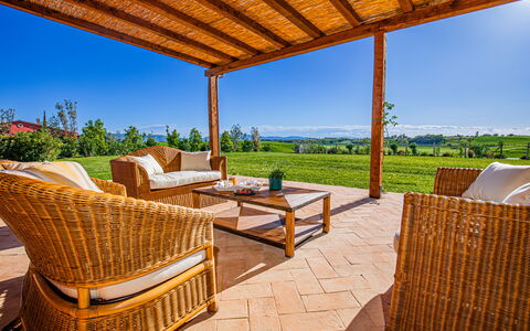 Villa Lodolaio: Furniture, Land Lot, Outdoor Furniture, Chair, Wood Stain, Shade, Deck, Garden, Resort, Hardwood