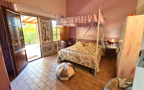 Suite Orchidea Seaside and Pool: Furniture, Interior Design, Table, Linens, Flooring, Floor, Chair, Bed, Bedroom, Room