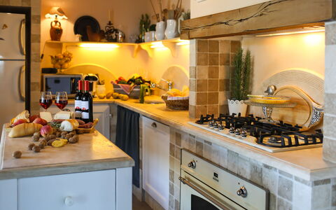 Villa Peccioli: Kitchen, Kitchen Appliance, Countertop, Interior Design, Furniture, Cabinetry, Home Appliance, Flooring, Kitchen Stove, Major Appliance