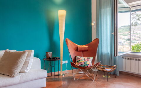 Villa Fior di Roccia: Furniture, Interior Design, Orange, Home, Room, Living Room, Chair, Paint, Lamp, Wood Stain