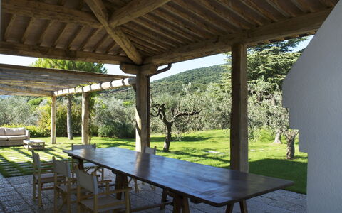 Castelprile: Wood, Column, Outdoor Furniture, Furniture, Shade, Porch, Outdoor Structure, Outdoor Table, Beam, Ceiling