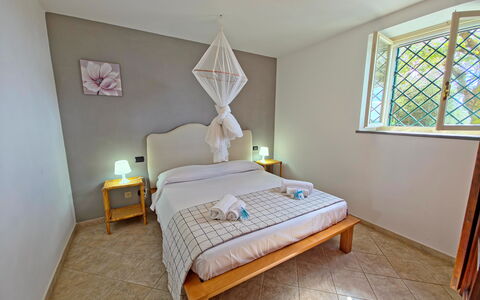 Villa Il Giardino: Furniture, Bed, Interior Design, Floor, Bedroom, Flooring, Bed Sheet, Wood, Bedding, Room