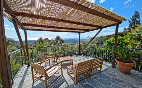 Villa Il Giardino: Wood, Porch, Hardwood, Shade, Wood Stain, Eco Hotel, Deck, Balcony, Outdoor Structure, Chair