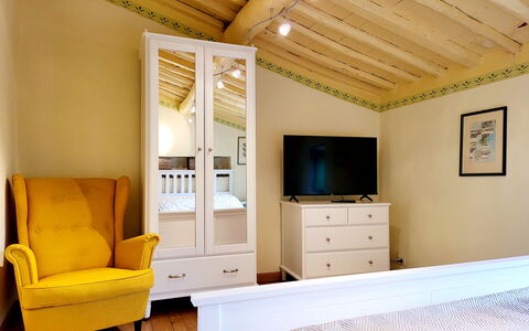 La Casa degli Artisti, Jacuzzi, Marliana: Furniture, Interior Design, Wall, Floor, Flooring, Wood, Room, Ceiling, Bed, Bedroom