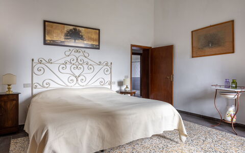 Podere le Lune with Pool, San Gimignano: Wall, Flooring, Bedroom, Floor, Interior Design, Bed, Furniture, Bedding, Bed Sheet, Ceiling