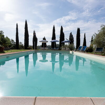 Podere le Lune with Pool, San Gimignano: Blue, Swimming Pool, Resort, Landscaping, Hacienda, Water Feature, Eco Hotel, Outdoor Furniture, Villa