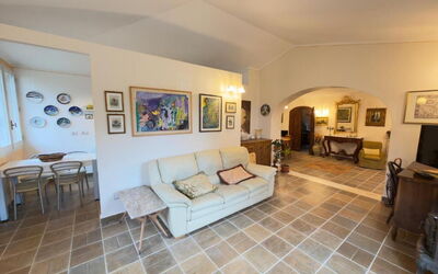 Villa Montepulciano Vineyard and Pool Retreat: Furniture, Flooring, Interior Design, Floor, Couch, Ceiling, Wood, Living Room, Room, Lighting