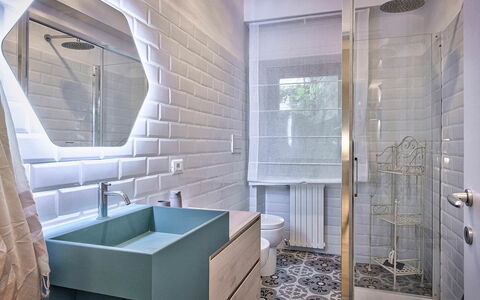 Cortona Deluxe: Flooring, Interior Design, Wall, Floor, Bathroom, Plumbing Fixture, Tap, Tile, Plumbing, Lighting