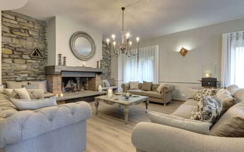 Villa Senio: Furniture, Interior Design, Couch, Flooring, Living Room, Wood, Home, Floor, Ceiling, Room