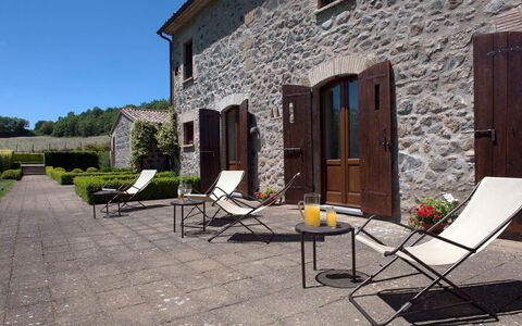 Villa Collombroso: Outdoor Furniture, Furniture, Outdoor Table, Flowerpot, Door, Garden, Flagstone, Chair, Kitchen & Dining Room Table, Houseplant