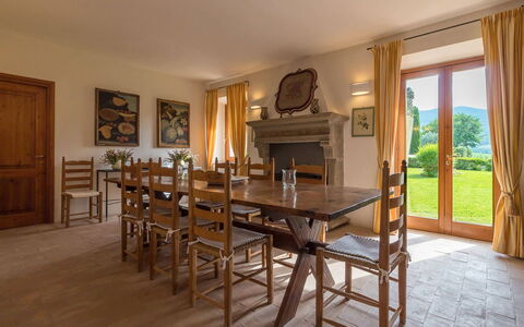 Villa Molinazzo 10: Furniture, Flooring, Table, Wood, Interior Design, Floor, Kitchen & Dining Room Table, Chair, Room, Dining Room