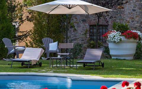 Villa Vorno: Umbrella, Furniture, Outdoor Furniture, Swimming Pool, Chair, Outdoor Table, Sunlounger, Shade, Table, Patio