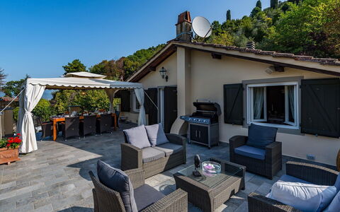 Villa Vorno: Furniture, Home, Chair, Shade, Outdoor Furniture, Patio, Resort, Deck, Outdoor Structure, Balcony