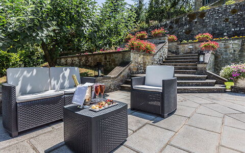 Villa Monterchi: Furniture, Outdoor Furniture, Chair, Flowerpot, Garden, Houseplant, Patio, Flagstone, Outdoor Table, Landscaping