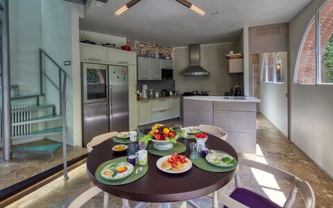 La Rocca di Monteggiori: Interior Design, Furniture, Kitchen, Flooring, Ceiling, Countertop, Lighting, Chair, Light Fixture, Floor