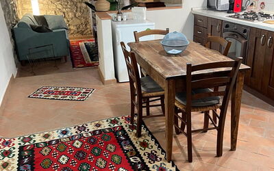 Nido: Furniture, Flooring, Floor, Interior Design, Carpet, Table, Room, Living Room