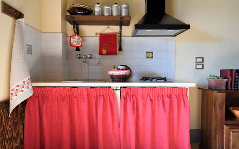 Terre di Giano Private Pool and View, Umbria: Interior Design, Flooring, Furniture, Room, Floor, Home, Kitchen, Linens, Cabinetry, Countertop