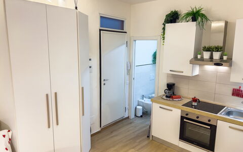 Studio Piccolo al Verticale - Levanto: Flooring, Interior Design, Furniture, Kitchen, Wood, Floor, Kitchen Appliance, Countertop, Cabinetry, Major Appliance