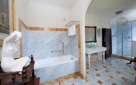 Castello di Cabbiavoli: Flooring, Interior Design, Floor, Bathtub, Plumbing Fixture, Lighting, Furniture, Bathroom, Ceiling, Room