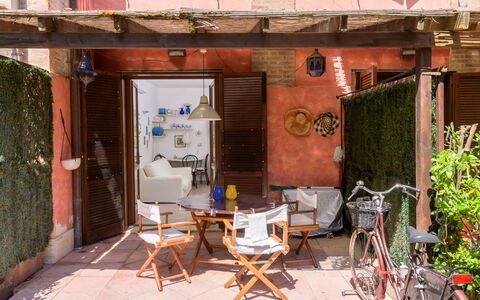 La Molletta: Wall, Flowerpot, Door, Furniture, Houseplant, Chair, Outdoor Furniture, Bicycle, Brick, Outdoor Table