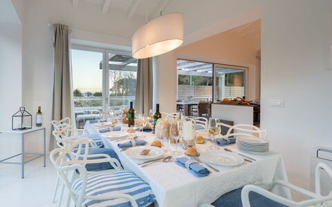 Villa Giomoa 8: Furniture, Interior Design, Chair, Table, Kitchen & Dining Room Table, Flooring, Dining Room, Floor, Ceiling, Lighting