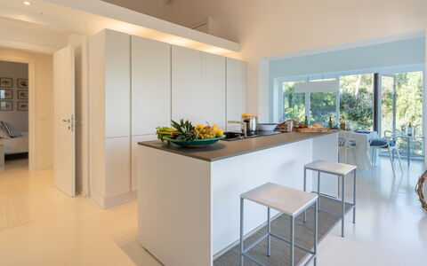 Villa Giomoa 8: Furniture, Interior Design, Kitchen, Flooring, Countertop, Wall, Floor, Wood, Ceiling, Chair
