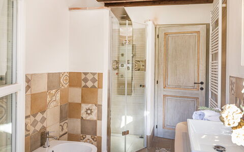 La Villetta di Dante 6: Flooring, Wall, Floor, Interior Design, Wood, Door, Home, Room, Bathroom, Tile