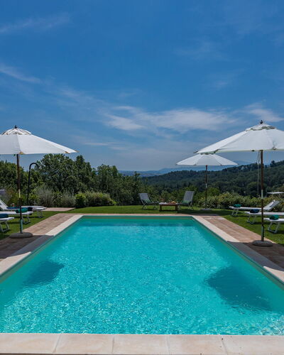 Il Colle di Donna Ilaria 12: Blue, Swimming Pool, Hill, Garden, Landscaping, Resort, Sunlounger, Plantation, Outdoor Furniture, Cumulus