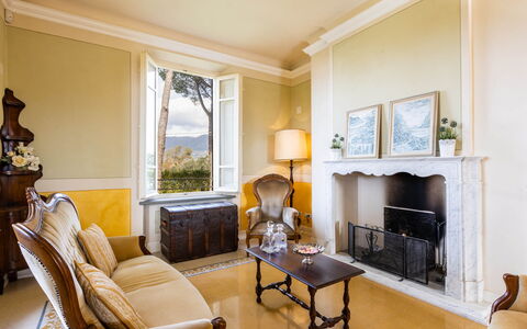 Villa Luigina 8: Interior Design, Furniture, Lighting, Flooring, Home, Ceiling, Room, Living Room, Floor, Chair
