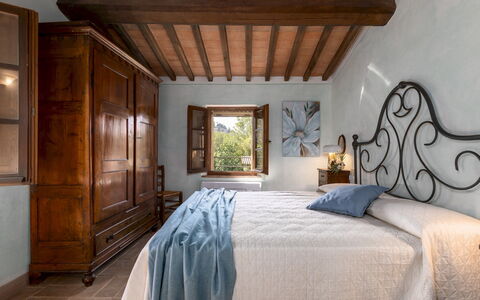 Podere Madonna di Mezzo 6: Wall, Furniture, Bedroom, Home, Bed, Flooring, Interior Design, Bed Frame, Bedding, Room
