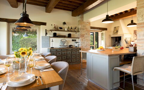 Casale dei Gelsomini 8: Furniture, Interior Design, Kitchen, Light Fixture, Chair, Wood, Flooring, Ceiling, Table, Kitchen & Dining Room Table