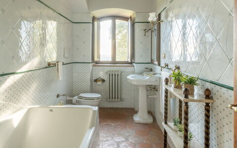 Vista del Lago 12: Interior Design, Plumbing Fixture, Tap, Tile, Plumbing, Bathroom, Light Fixture, Sink, Bathroom Sink, Houseplant