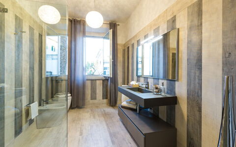 Villa Sole al Molino a Vento 8: Flooring, Wall, Bathroom, Plumbing Fixture, Interior Design, Floor, Lighting, Mirror, Light Fixture, Ceiling