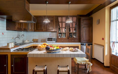 Villa Costanza 6: Furniture, Kitchen, Countertop, Interior Design, Cabinetry, Flooring, Kitchen Appliance, Wood, Light Fixture, Floor