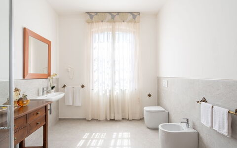 Villa Fiorentini 10: Wall, Flooring, Plumbing Fixture, Floor, Interior Design, Bathroom, Tap, Plumbing, Sink, Bathroom Sink