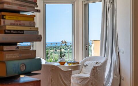 Villa le Cave 12: Furniture, Interior Design, Room, Floor, Lighting, Home, Chair, Sea, Window Treatment, Apartment