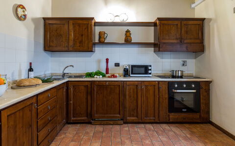 Villa le Tornaie 14: Kitchen, Wood, Countertop, Cabinetry, Interior Design, Furniture, Flooring, Kitchen Appliance, Major Appliance, Room