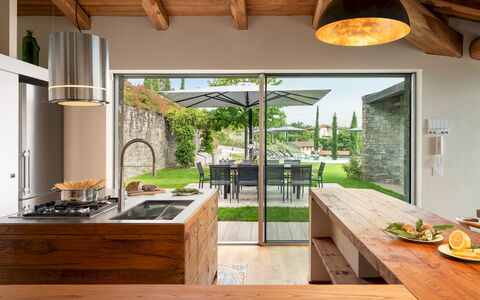 Villa Krisztina 10: Furniture, Kitchen, Interior Design, Countertop, Flooring, Wood, Kitchen & Dining Room Table, Ceiling, Floor, Chair
