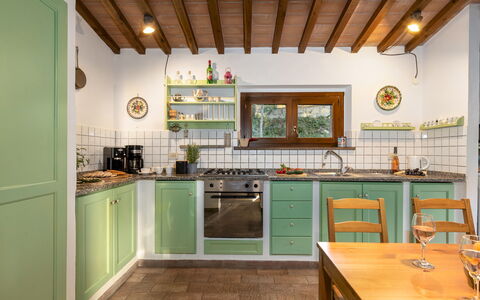 La Nula 4: Kitchen, Interior Design, Wood, Countertop, Furniture, Cabinetry, Kitchen Appliance, Flooring, Ceiling, Major Appliance