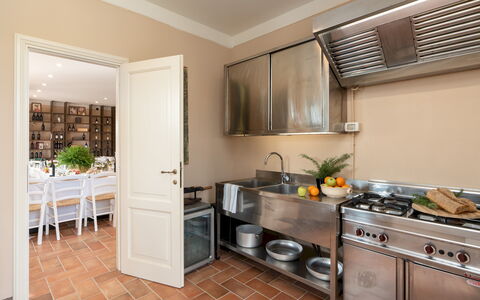 Villa Iole 14: Kitchen, Countertop, Interior Design, Kitchen Appliance, Furniture, Wood, Flooring, Cabinetry, Major Appliance, Ceiling