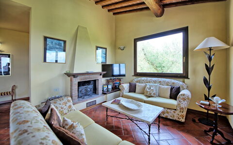 Villa Ulivi: Picture Frame, Furniture, Couch, Table, Azure, Interior Design, Plant, Wood, Living Room, Window