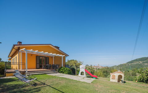 La Casa al Monte: Sky, Plant, Building, Window, Slope, Land Lot, Tree, House, Grass, Leisure