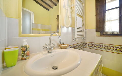 Le Rondini: Bathroom, Sink, Property, Room, Tap, Interior Design, Tile, Bathroom Sink, Yellow, Wall
