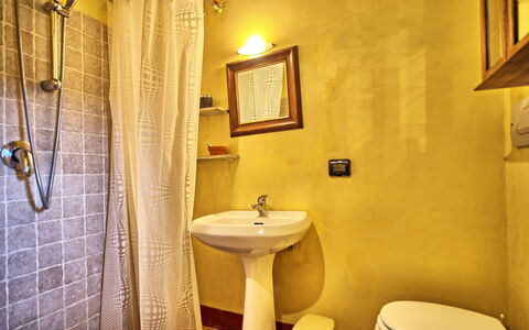 Podere Orietta: Bathroom, Room, Property, Yellow, Interior Design, Toilet, Wall, Plumbing Fixture, Tile, Architecture