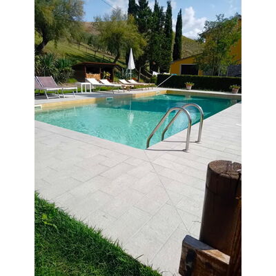 Villa Alabastro: Swimming Pool, Flooring, Flagstone, Composite Material, Shade, Garden, Tile, Water Feature, Concrete, Outdoor Furniture